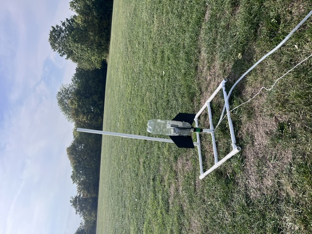 Single bottle water rocket on launch base